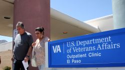 FILE - In this June 9, 2014 file photo, David and Marianne Trujillo exit the Vetarans Affairs facility in El Paso, Texas. In an analysis of six months of appointment data at 940 VA hospitals and clinics nationwide from September 2014 to February 2015, despite a nationwide push to lessen the wait times for veterans seeking health care, VA medical facilities across Texas have shown little to no sustained progress. The dilemma mirrors a trend across the country in which facilities are struggling to improve how often they meet the U.S. Department of Veterans Affairs' goal to have patients seen within 30 days. (AP Photo/Juan Carlos Llorca, File)