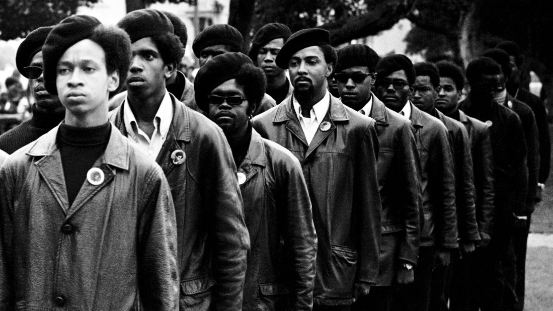 Panthers line up at a rally in DeFremery Park, in Oakland, California. The Panthers' focus on police brutality in the black community and racial bias in the criminal justice system anticipated the Black Lives Matter movement 50 years later. 