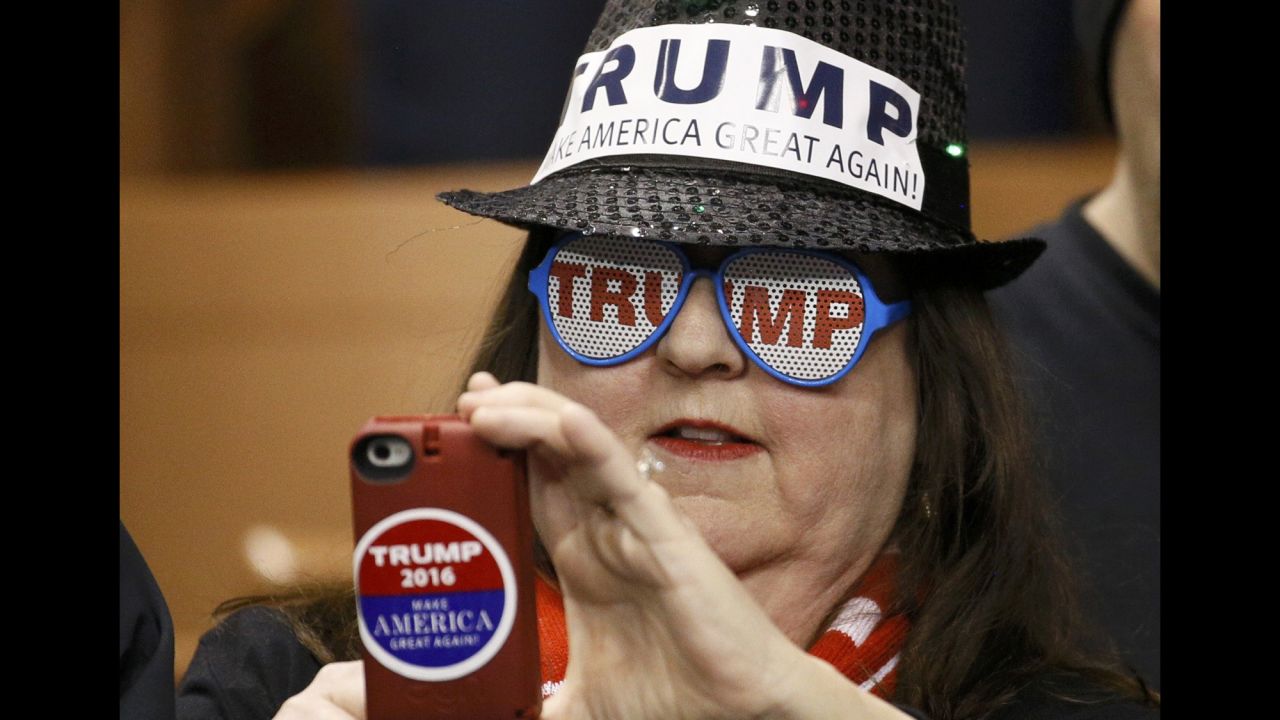 A Donald Trump supporter takes a photo on her phone as she attends a campaign rally in Manchester, New Hampshire, on Monday, February 8. Trump <a href="http://www.cnn.com/2016/02/09/politics/new-hampshire-primary-highlights/index.html" target="_blank">won the state's GOP primary</a> the next day, getting 35% of the vote. Ohio Gov. John Kasich finished in second with 16%.