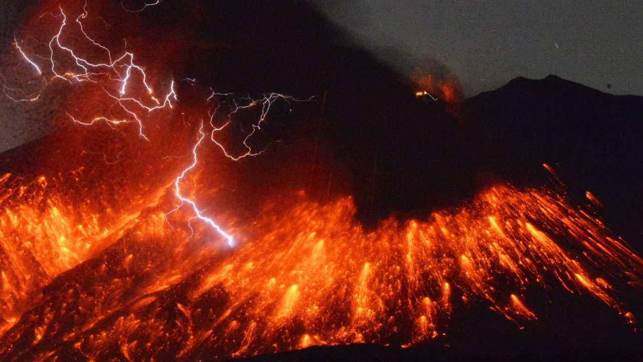 Lightning flashes above Japan's Sakurajima volcano as it erupts on Friday, February 5.