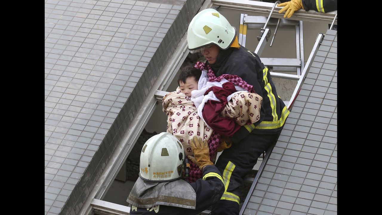 A child is rescued from a toppled building in Tainan, Taiwan, after <a href="http://www.cnn.com/2016/02/07/asia/taiwan-earthquake/" target="_blank">a magnitude-6.4 earthquake struck</a> on Saturday, February 6. At least 37 people were killed in the earthquake, authorities said.