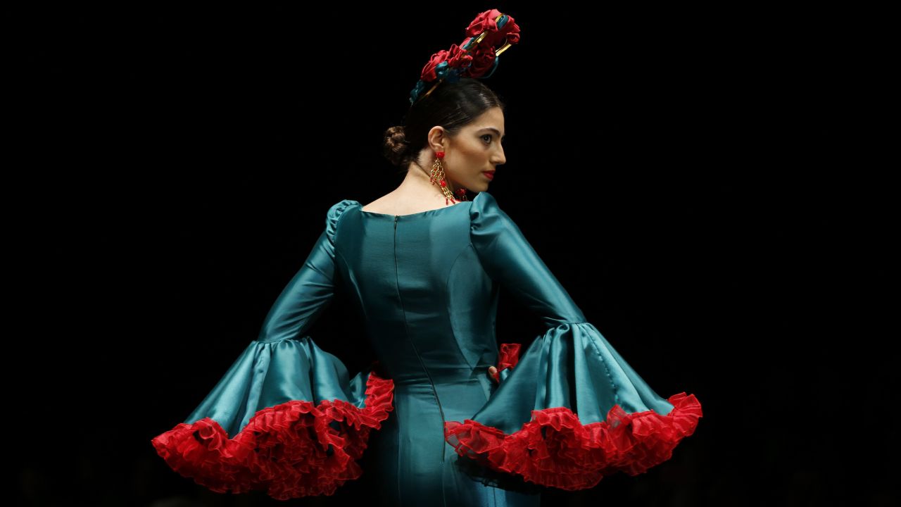 A model presents a creation by Cristina Granero during a fashion show in Seville, Spain, on Friday, February 5.