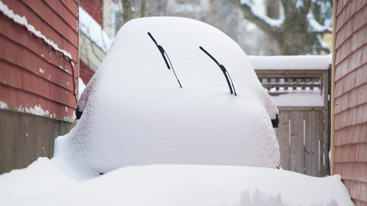 A car is buried under snow following a snowstorm in Halifax, Nova Scotia, on Tuesday, February 9.