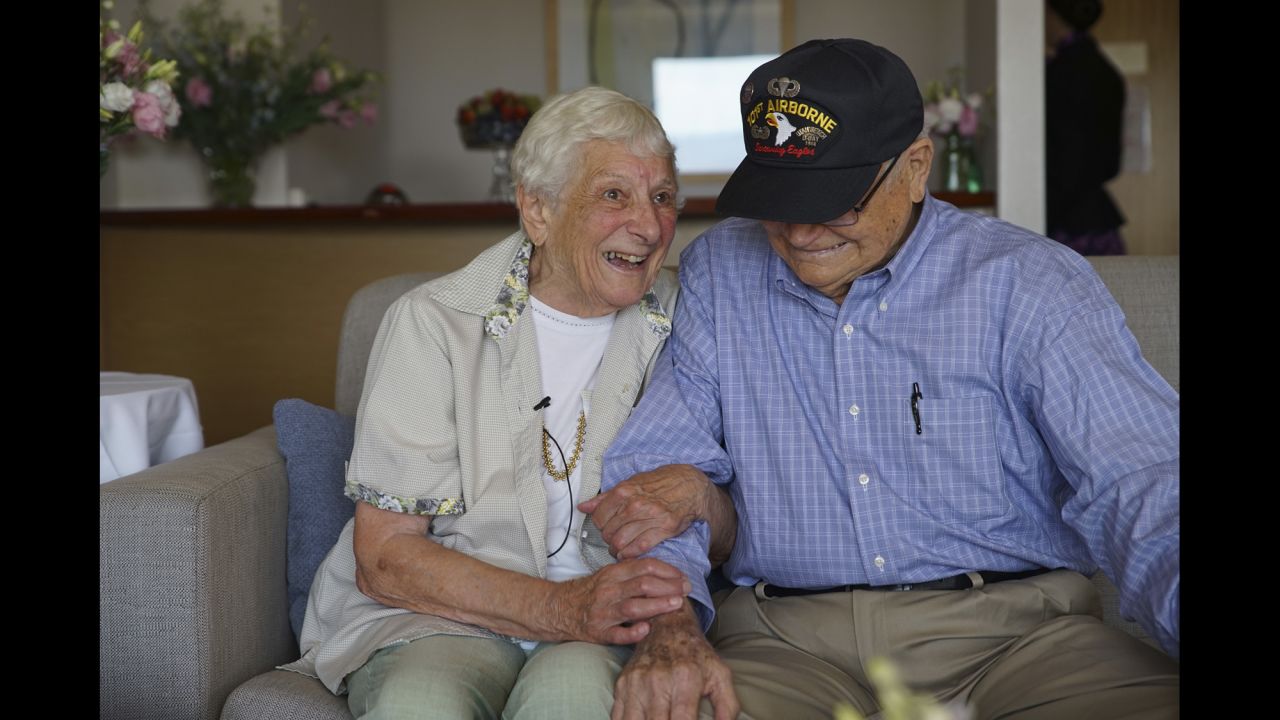 World War II veteran Norwood Thomas reunites with wartime girlfriend Joyce Morris in Adelaide, Australia, on Wednesday, February 10. They hadn't seen each other in more than 70 years. Thomas was a 21-year-old paratrooper when he met Morris in London shortly before D-Day. She was 17 at the time.