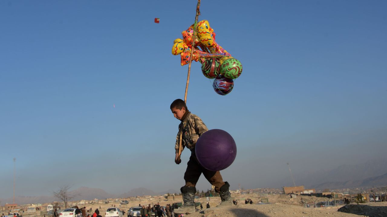A young balloon vendor waits for customers as he walks through a cemetery in Kabul, Afghanistan, on Friday, February 5. <a href="http://www.cnn.com/2016/02/05/world/gallery/week-in-photos-0205/index.html" target="_blank">See last week in 33 photos</a>