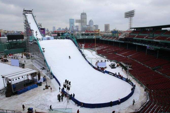 A snowboarder makes a practice run down the ski and snowboarding ramp at Fenway Park, Boston, ahead of the Big Air at Fenway event.