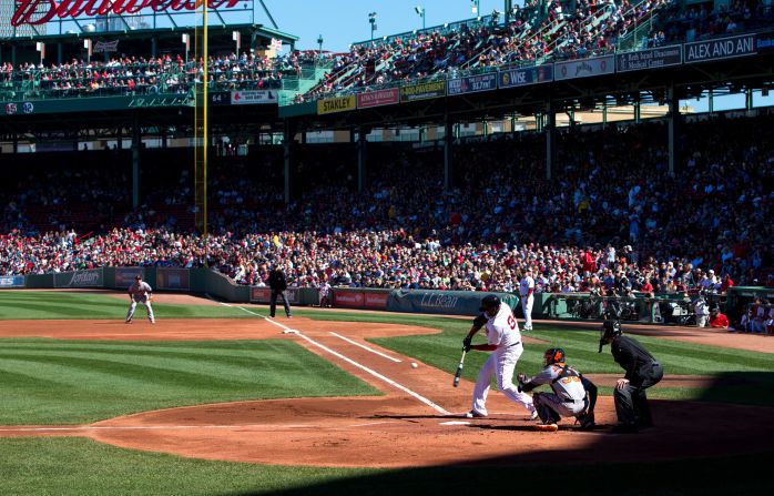 A more traditional view of Fenway Park as slugger David Ortiz swings from the plate against the Baltimore Orioles.