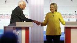 Democratic presidential candidates, Sen. Bernie Sanders, I-Vt, and Hillary Clinton shake hands after a Democratic presidential primary debate at the University of Wisconsin-Milwaukee, Thursday, Feb. 11, 2016, in Milwaukee. (AP Photo/Morry Gash)