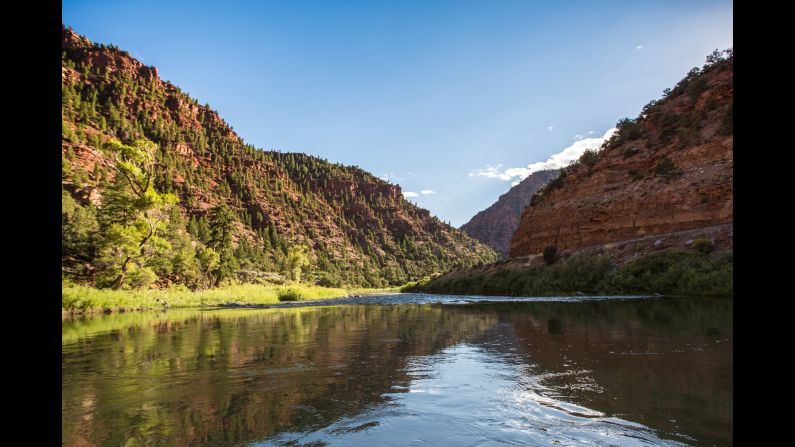 Green banks line the Upper Colorado River near the beginning of its 1,450-mile trek toward the Pacific.