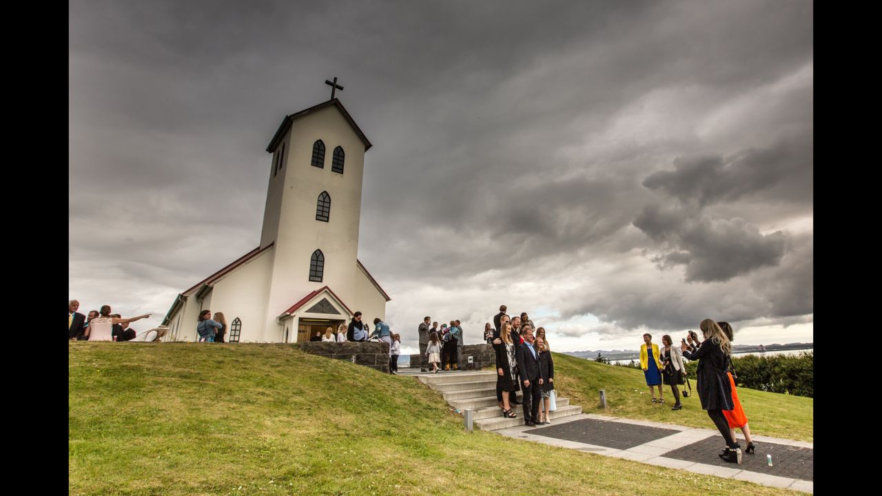 A church hosts a wedding on the outskirts of Reykjavik. Iceland leads the developed world in unwed mothers, with two out of every three kids born to parents who are not married.