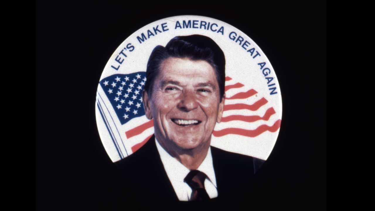 A Ronald Reagan campaign button shows his 1980 slogan, "Let's Make America Great Again."