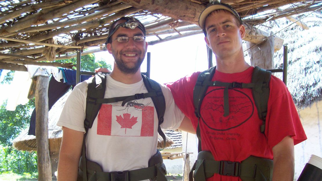 Graduate student Kevin Kobylinski, left, and microbiologist  Brian Foy in Senegal.
