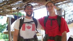 Graduate student Kevin Kobylinski, left, and microbiologist  Brian Foy in Senegal.