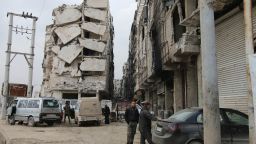 In this Thursday, Feb. 11, 2016 photo, a building is seen with heavy damage in Aleppo, Syria. The fighting around Syria's largest city of Aleppo has brought government forces closer to the Turkish border than at any point in recent years, routing rebels from key areas and creating a humanitarian disaster as tens of thousands of people flee. (Alexander Kots/Komsomolskaya Pravda via AP)