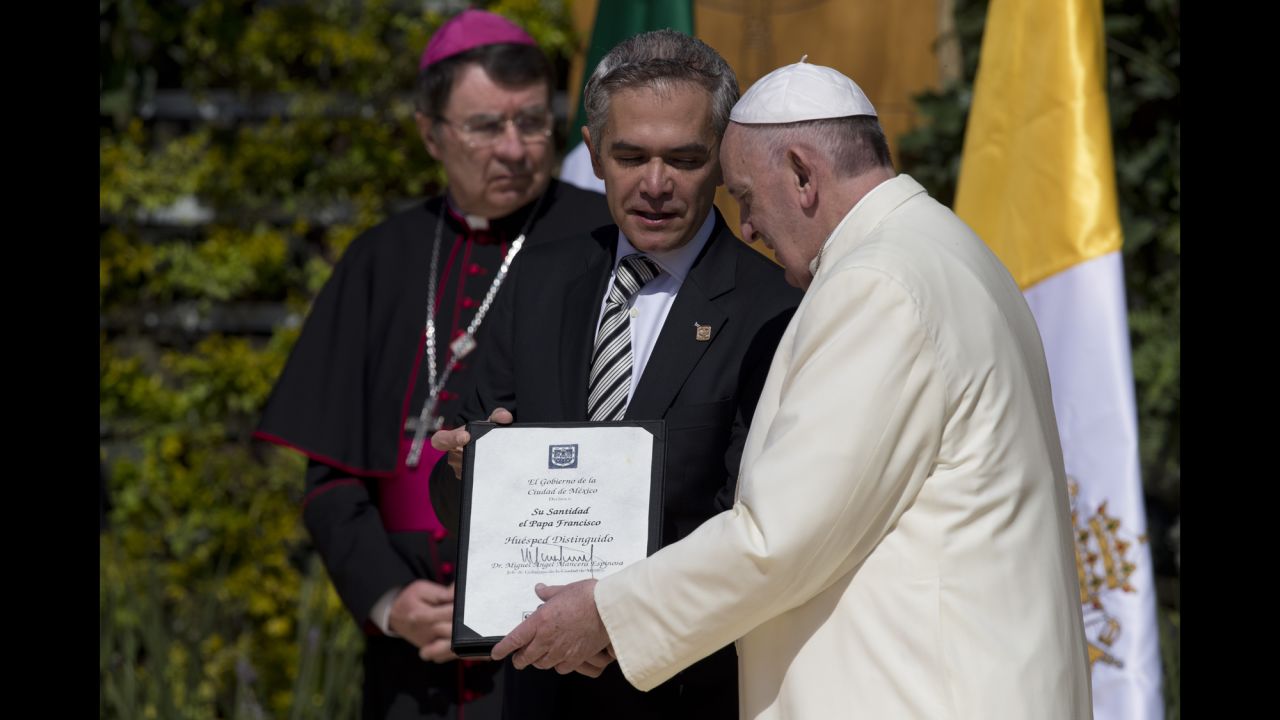 Pope Francis is recognized as a distinguished guest by Mexico City Mayor Miguel Angel Mancera on February 13.