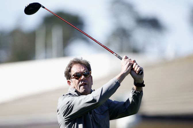 Musician Huey Lewis, of Huey Lewis and the News fame, tees off  at the Pebble Beach National Pro-Am. 