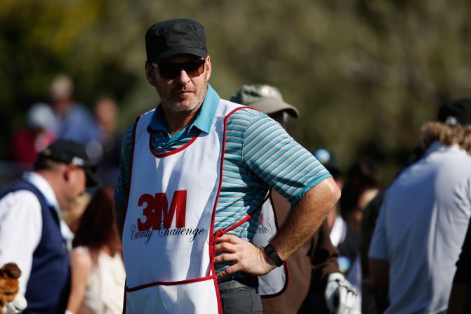 Is that Harrison Ford? No, it's actually five-time major-winner, Nick Faldo, on caddy duty at Pebble Beach. 