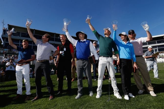 All for one! From left to right, Musician Clay Walker, Musician Huey Lewis, Comedian Bill Murray, Actor Josh Duhamel, Musician Kenny G, and Musician Toby Keith pose for the cameras at the beginning of the Pebble Beach Pro-Am golf tournament in Pebble Beach, California.