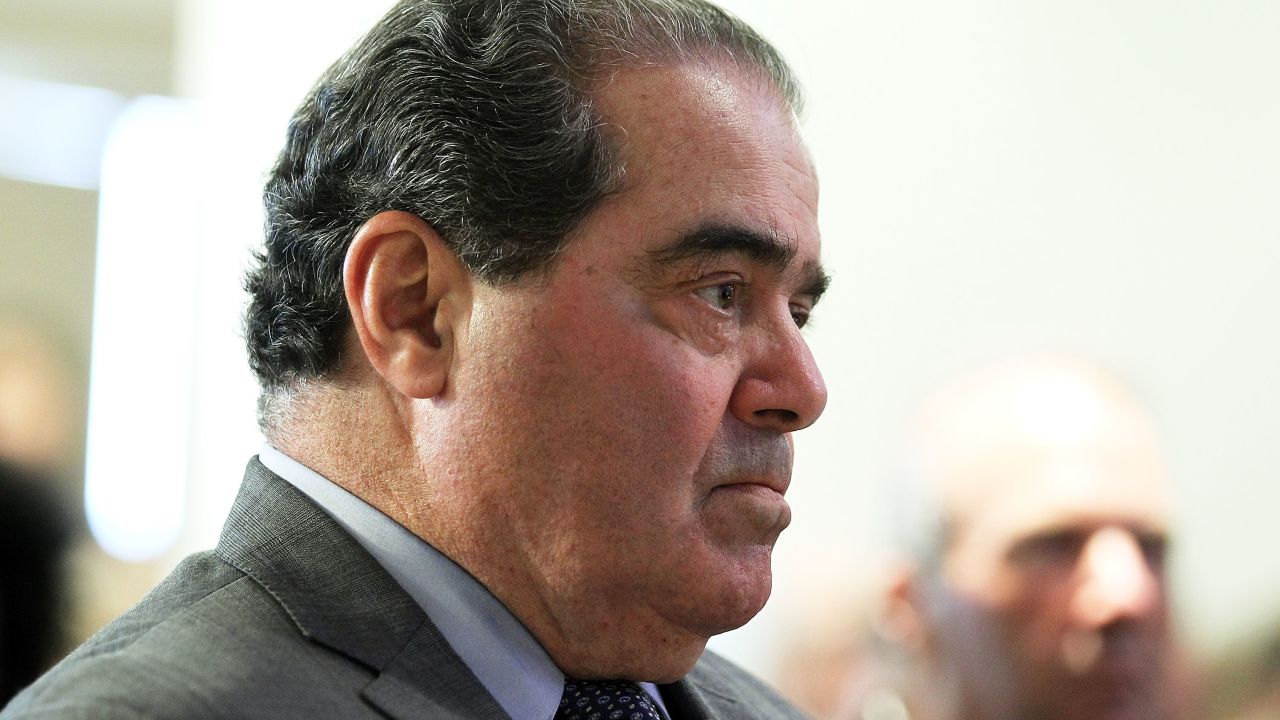 Supreme Court Justice Antonin Scalia waits to be introduced to speak on October 2, 2012, in Washington, D.C.