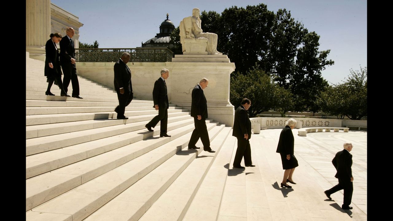  Members of the U.S. Supreme Court, Justice Ruth Bader Ginsburg, Justice Stephen Breyer, Justice Clarence Thomas, Justice David Souter, Justice William Kennedy, Justice Antonin Scalia, Justice Sandra Day O'Connor and Justice John Paul Stevens file out of the U.S. Supreme Court Building to attend funeral services for Chief Justice William Rehnquist on September 7, 2005, in Washington.
