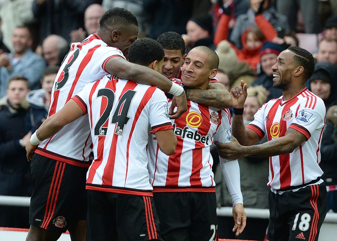 Sunderland's French-born Tunisian midfielder Wahbi Khazri (center) celebrates scoring his team's first goal against Manchester United.