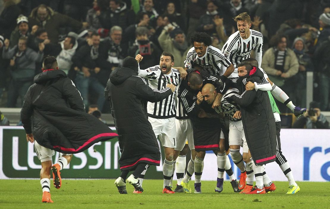 Simone Zaza (center) celebrates with his team-mates after scoring during the Serie A match between Juventus and Napoli. 