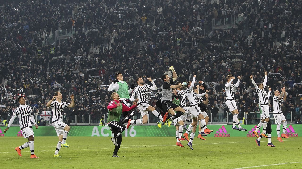 Juventus players celebrate its narrow 1-0 win over Napoli on February 13.