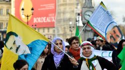 People wave flags with the portrait of the jailed leader of the Kurdistan Workers Party (PKK) Abdullah Ocalan during a demonstration in Bordeaux on January 23, 2016 called by associations for the defence of the Kurdish people and the 'Mouvement de la Paix' to denounce Turkish operations in southeast Turkey. / AFP / GEORGES GOBETGEORGES GOBET/AFP/Getty Images