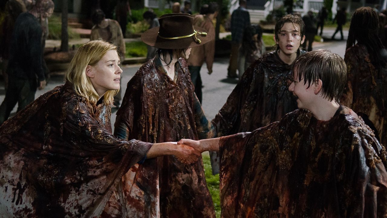 Chandler Riggs as Carl Grimes, Alexandra Breckenridge as Jessie Anderson, and Austin Abrams as Ron- The Walking Dead _ Season 6, Episode 9 - Photo Credit: Gene Page/AMC 