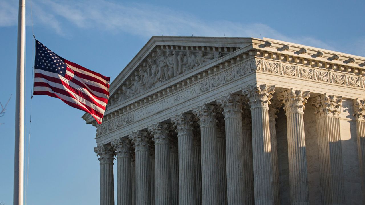 WASHINGTON, DC - FEBRUARY 14:  An American flag flies at half mast following the death of Supreme Court Justice Antonin Scalia at the U.S. Supreme Court, February 14, 2016 in Washington, DC. Supreme Court Justice Antonin Scalia was at a Texas Ranch Saturday morning when he died at the age of 79. (Drew Angerer/Getty Images)