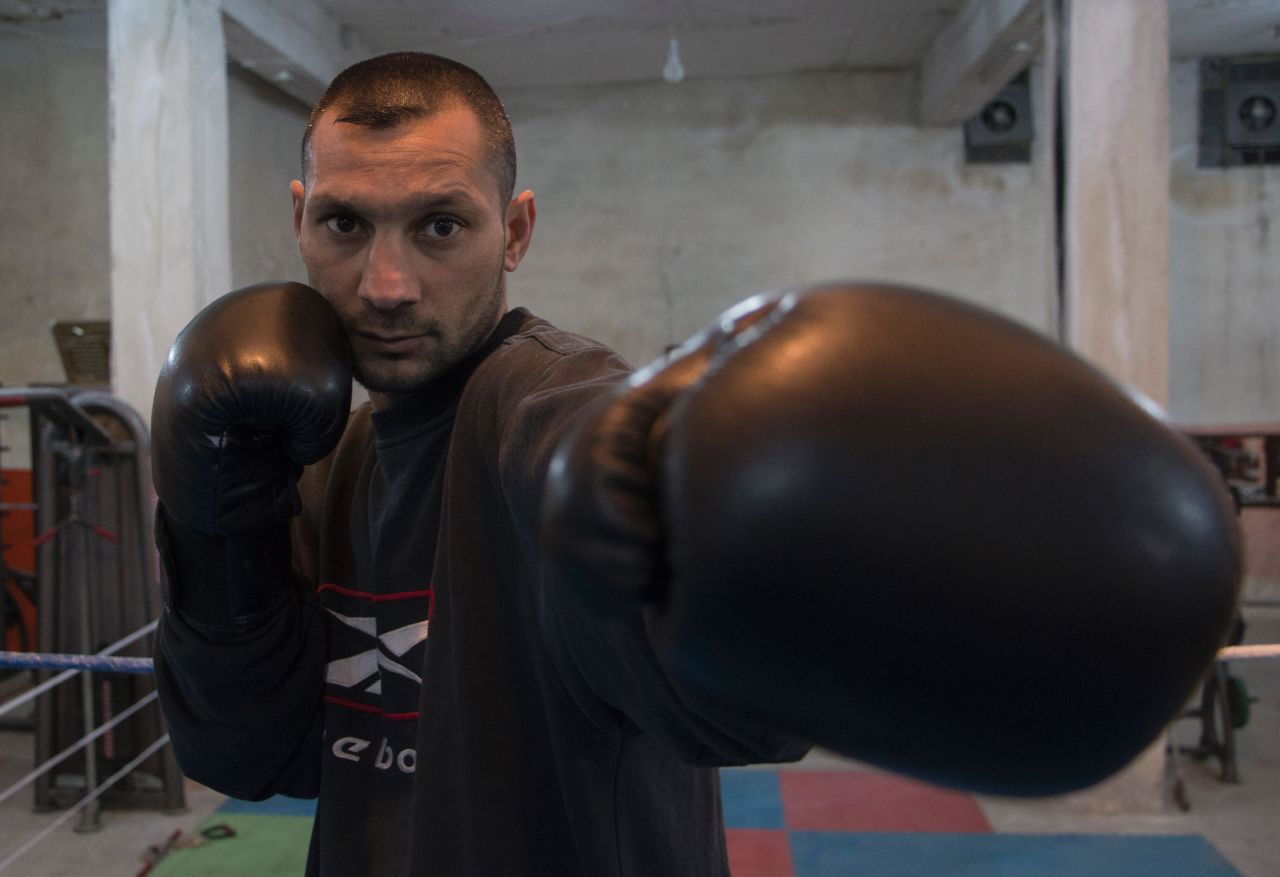 Former national boxing champion Shaaban Kattan leads a training session at the Shahba boxing club. He founded the club in Syria's war-torn city of Aleppo in the summer of 2015.