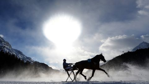 The frozen lake is checked meticulously to ensure it remains thick enough.