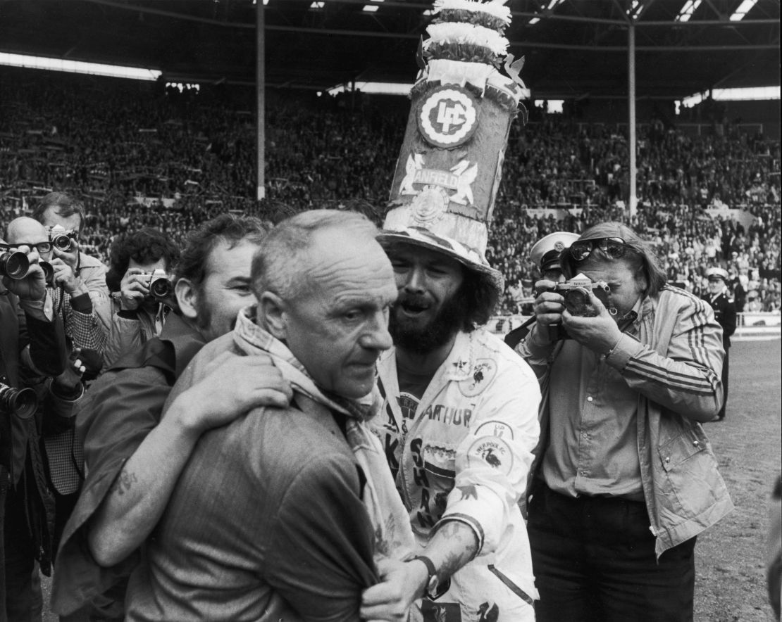 Bill Shankly receives the praise of jubilant Liverpool fans after defeating Leeds United in the 1974 Charity Shield match.