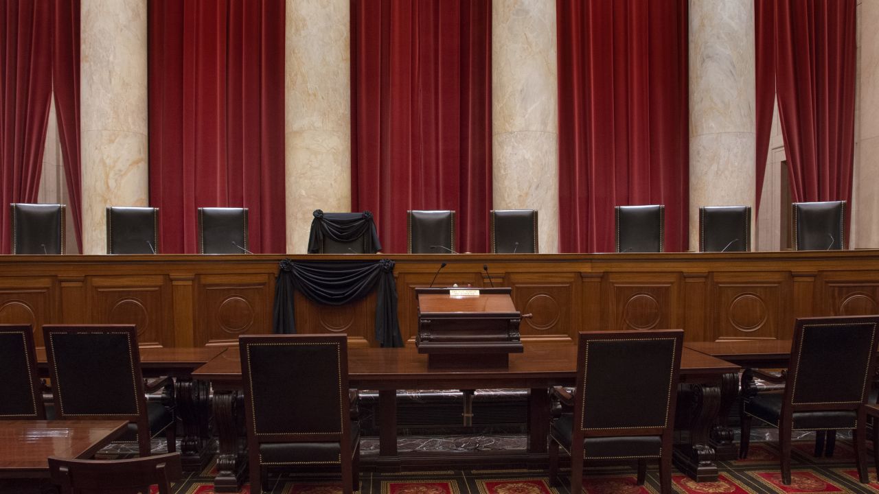 The Courtroom of the Supreme Court showing Associate Justice Antonin Scalia's Bench Chair and the Bench in front of his seat draped in black following his death on February 13, 2016.  