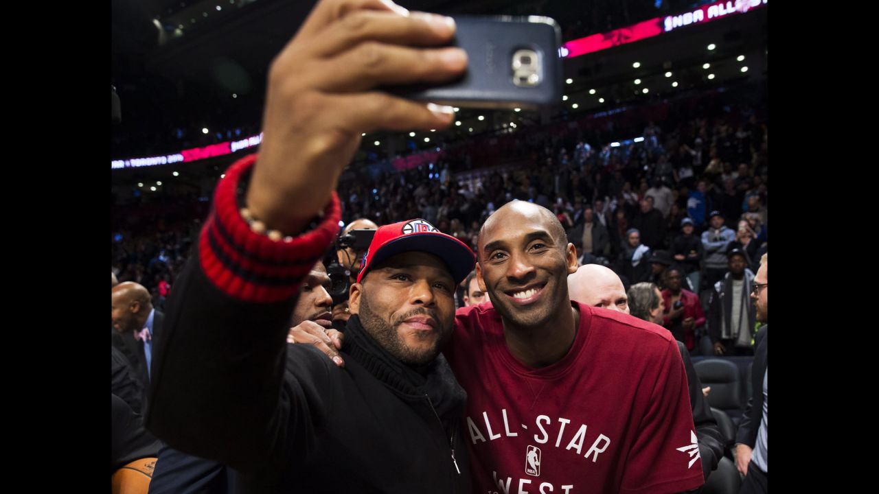 Actor Anthony Anderson snaps a selfie with basketball player Kobe Bryant during the NBA All-Star Game on Sunday, February 14.
