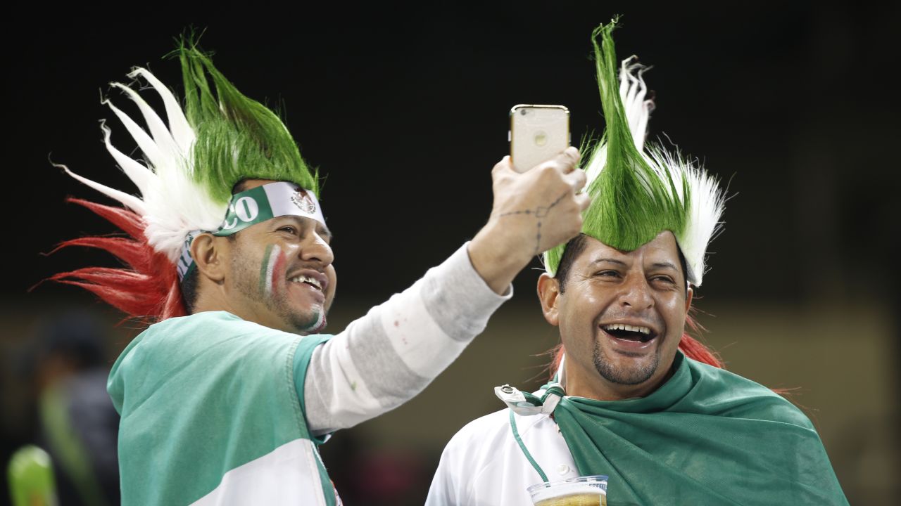 Mexico soccer fans take a selfie before the start of a match in Miami on Wednesday, February 10.