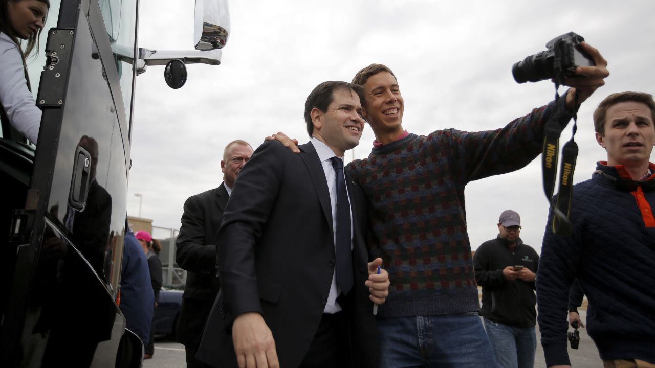 U.S. Sen. Marco Rubio, a Republican presidential candidate, poses for a supporter's selfie after a town-hall event in Easley, South Carolina, on Sunday, February 14.
