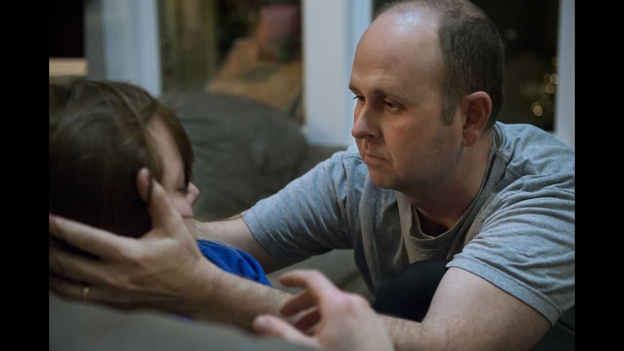 Klein's husband, Jeff, tries to snap her out of a dissociative episode. During these flashbacks, she relives a trauma from her childhood. She becomes fearful and disconnected from reality, and she does not recognize Jeff. He tries to bring her out of it by asking her to say his name, and by placing cold objects in her hands. Stimuli that are disconnected from her flashback help to bring her out of it. Usually the flashbacks occur at night when she's sleeping, but this time it came while the couple were in their living room.