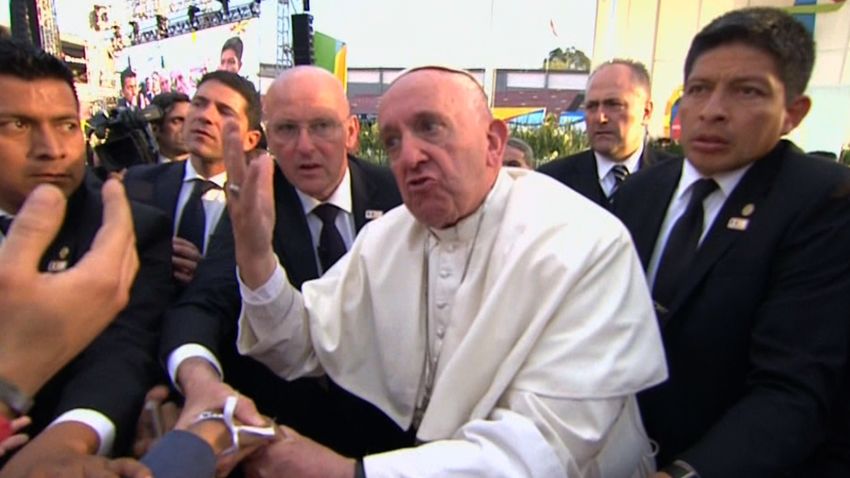 pope francis pulled into crowd vo 1