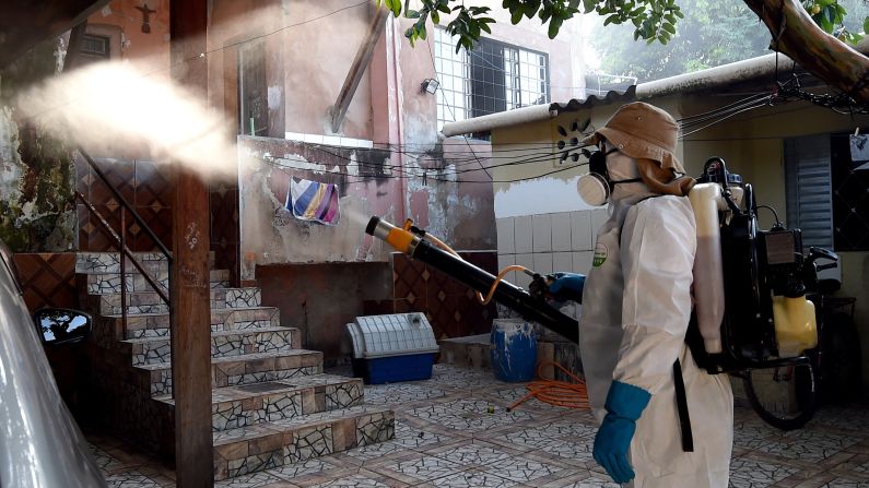 A health worker fumigates an area in Gama, Brazil, to combat the Aedes aegypti mosquito on Wednesday, February 17. The mosquito carries the <a href="index.php?page=&url=http%3A%2F%2Fwww.cnn.com%2Fspecials%2Fhealth%2Fzika" target="_blank">Zika virus,</a> which has suspected links to birth defects in newborn children. The World Health Organization expects the Zika outbreak to spread to <a href="index.php?page=&url=http%3A%2F%2Fwww.cnn.com%2F2016%2F01%2F25%2Fhealth%2Fwho-zika-virus-americas%2Findex.html" target="_blank">almost every country in the Americas.</a>