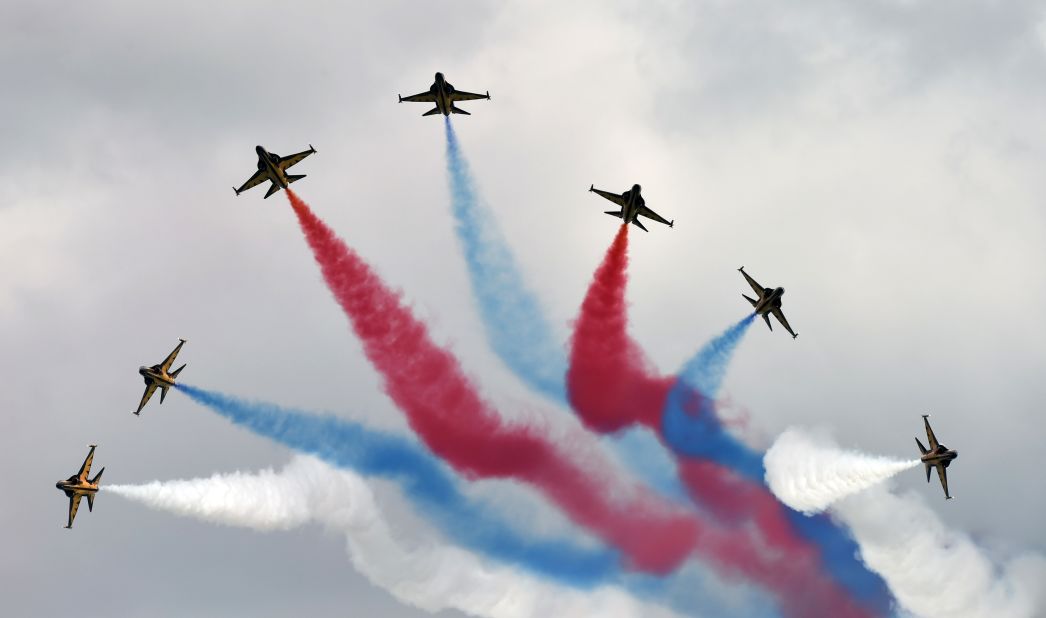 South Korea's Black Eagles aerobatics team paints the sky with streaks of colors from the South Korean flag during the Singapore Airshow on February 14.