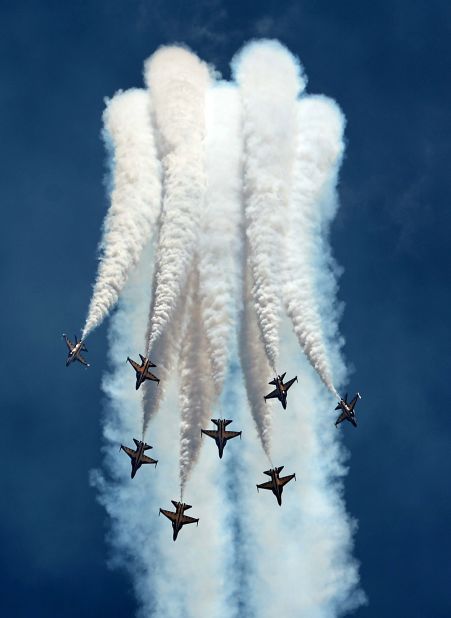 South Korea's Black Eagles aerobatics team flying KAI T-50B aircraft performs an aerial display during the Singapore Airshow on February 16.