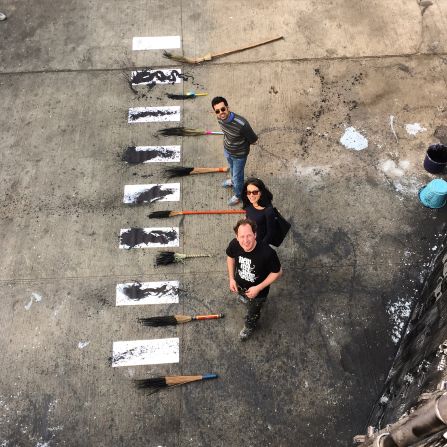 Shoe at the Inland Container Depot with his tools. The artists used brooms for the works in Delhi. <em>(Photograph by Hanif Kureshi)</em>