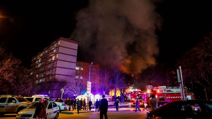 ANKARA, TURKEY - FEBRUARY 17: Smoke billows from the blast site as Turkish army service busses burn after an explosion on February 17, 2016 in Ankara, Turkey. 21 people are believed to have been killed and at least 61 are said to be wounded according to the city's governor Mehmet Kiliclar in what appeared to have been a car bomb attack on a vehicle carrying military personnel in the Turkish capital. (Photo by Defne Karadeniz/Getty Images)