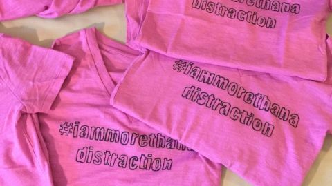 Shirts made by Niv Miyasatok in support of the #IAmMoreThanADistraction movement.