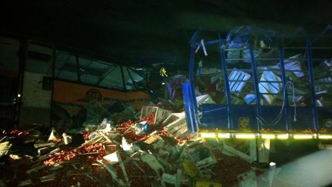 A bus collided with a truck in central Ghana on Wednesday night, killing at least 61 people, police said.