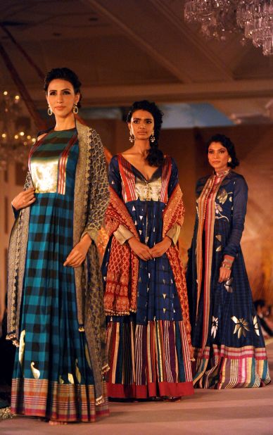 The Benarasi sari is given a modern twist with distinctly Western traits, such  as check prints.