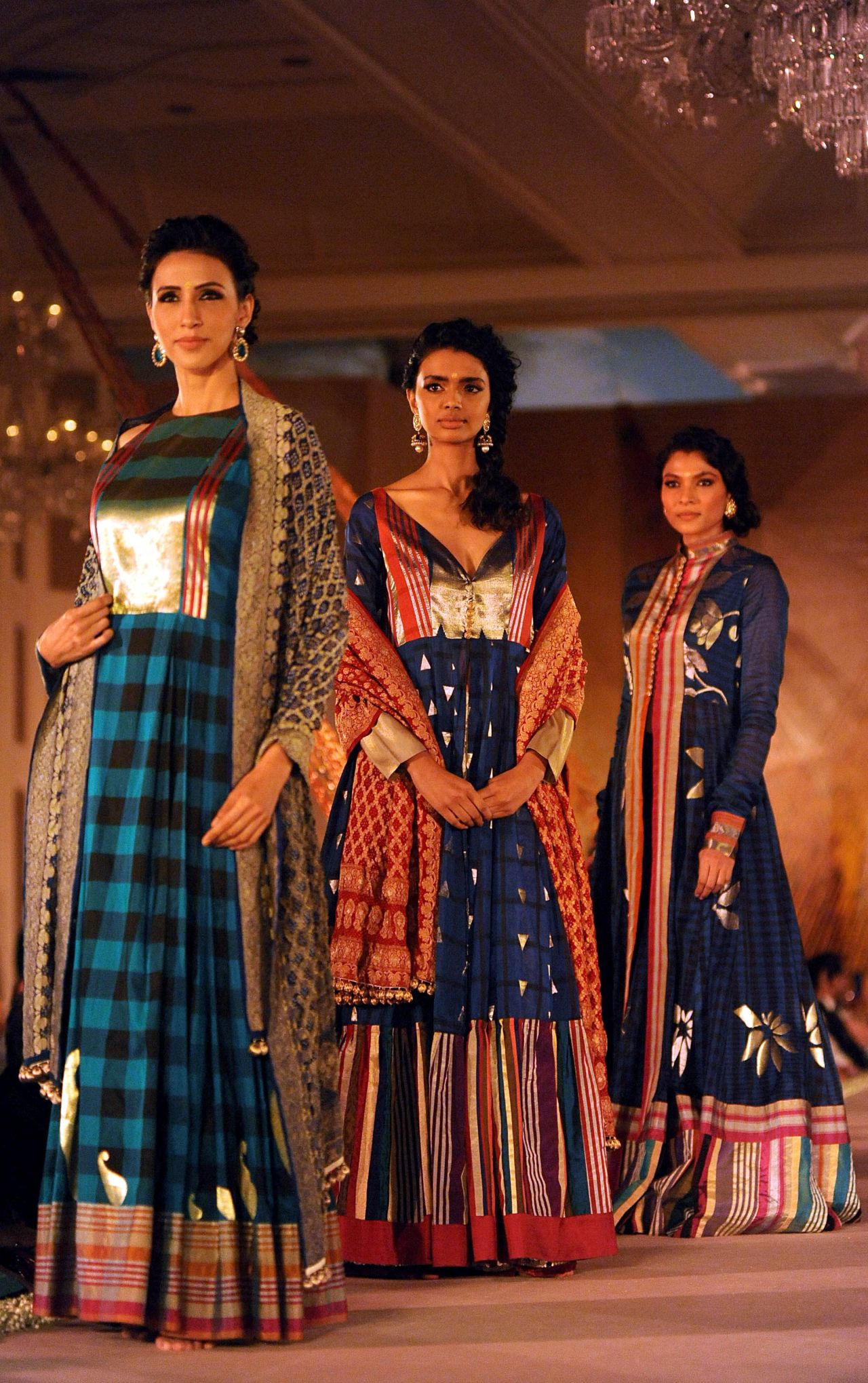 The Benarasi sari is given a modern twist with distinctly Western traits, such as check prints.