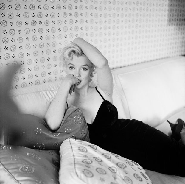 Monroe posed for many celebrated photographers of her day including, here, for Cecil Beaton at a portrait session 1956. 