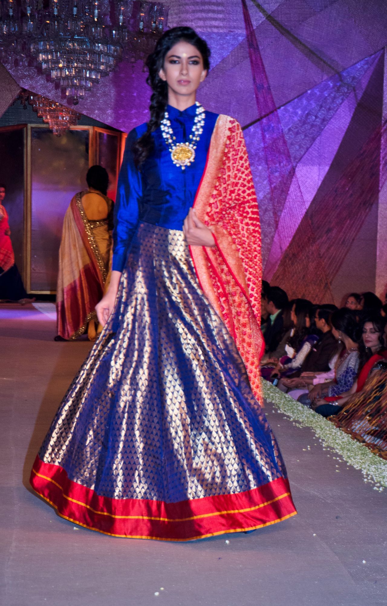 Vibrant colors are a signature of the Indian sari - here it's the form that has been updated.